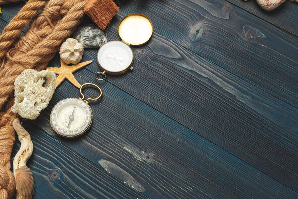 Nautical background. Sailing rope with a compass