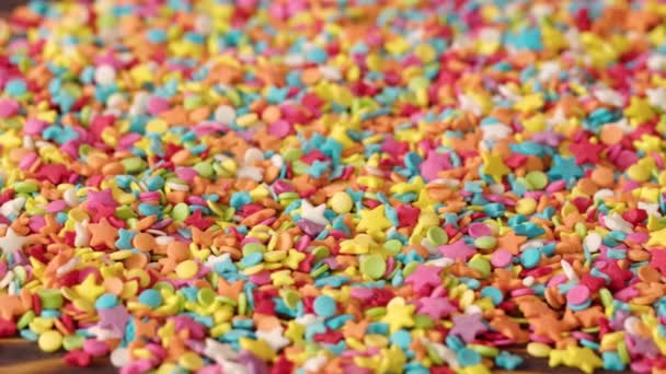 Arrière-plan de bonbons colorés saupoudrer de près — Video