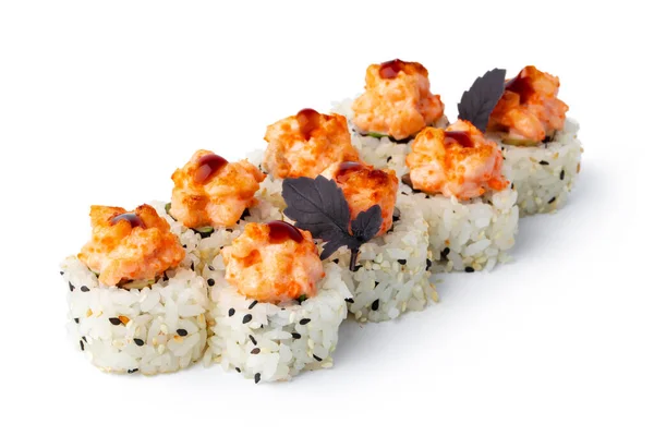 Sushi japonés con semillas de sésamo y glaseado de crema aislado en blanco — Foto de Stock