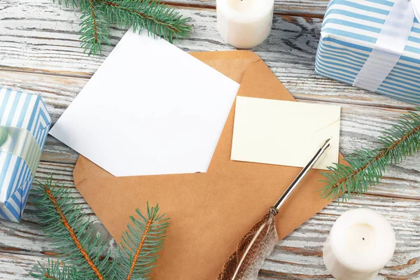 Top view of letter to Santa Claus concept. Paper on wooden background with holiday decorations — Stock Photo, Image