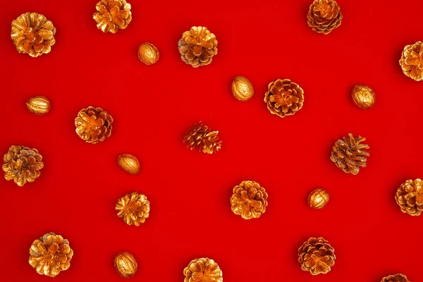 Christmas pattern of holiday decorations on red background