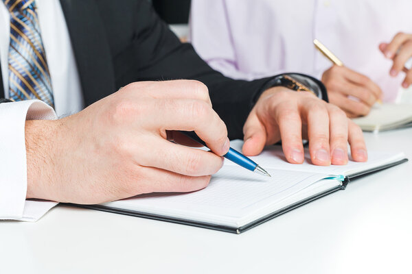 Hands of businesspeople