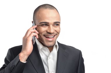 Genç işadamı beyaz arka plan üzerinde izole