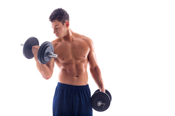 Portrait of a muscular man lifting weights