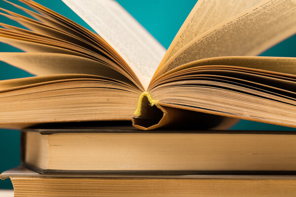 books on wooden deck tabletop