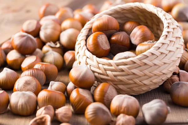 Hazelnuts on wooden background — Stock Photo, Image