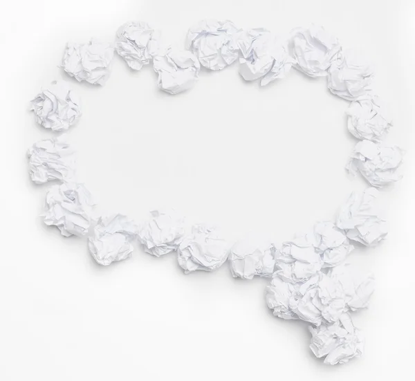 Beyaz masa üzerinde buruşuk kağıt — Stok fotoğraf