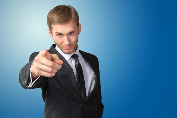 Businessman pointing on you Stock Image