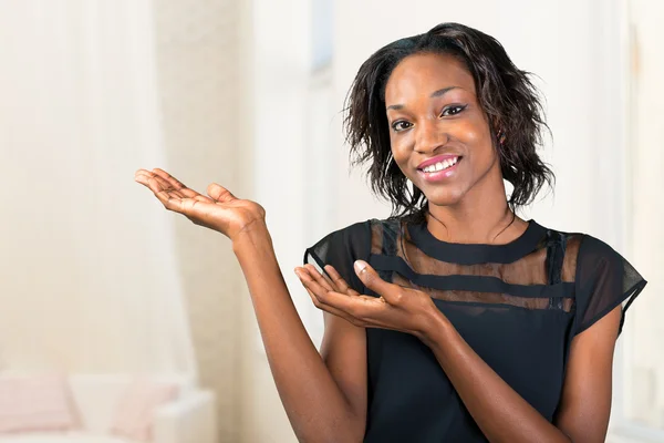 Young African Woman Presenting — Stock Photo, Image