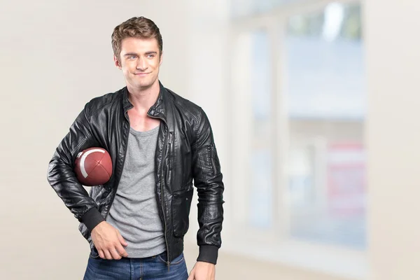Football player portrait holding american football — Stock Photo, Image