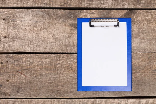 Papel em branco na área de transferência — Fotografia de Stock