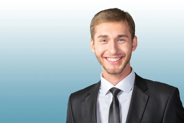 Bonito homem de negócios sorrindo — Fotografia de Stock