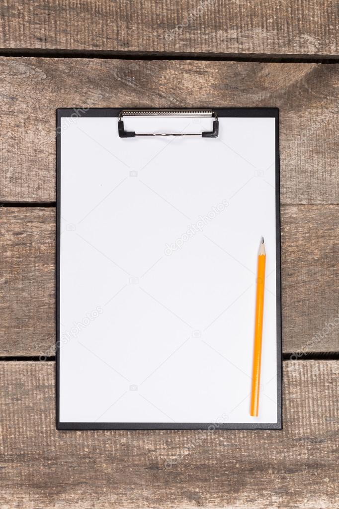 blank paper in clipboard