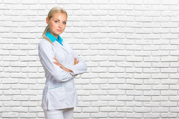 Doctor woman in medical gown — Stock Photo, Image