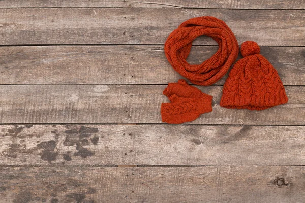 Knitwear on a wooden background. — Stock Photo, Image