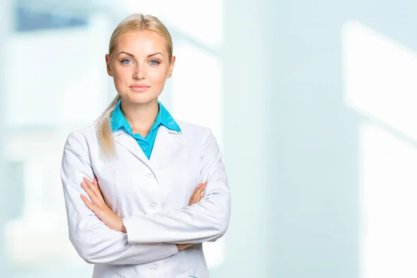 Doctor woman in medical gown Stock Picture