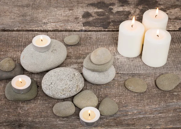 Grey stones, candle — Stock Photo, Image