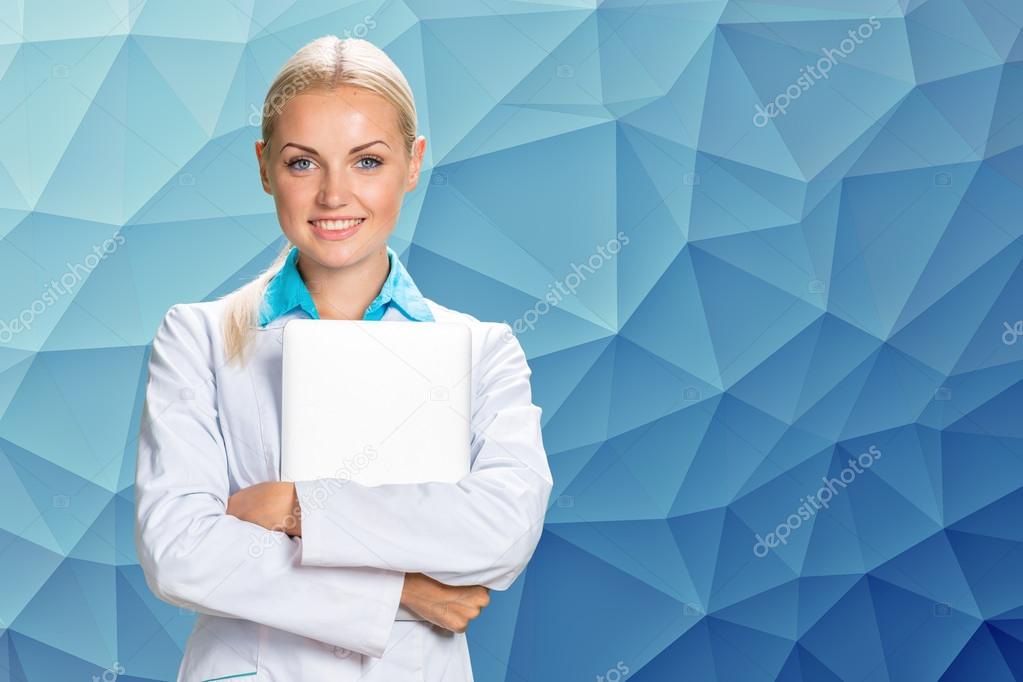 smiling doctor woman in medical gown