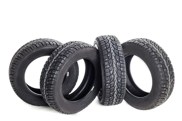 Черные шины, изолированные на белом — стоковое фото