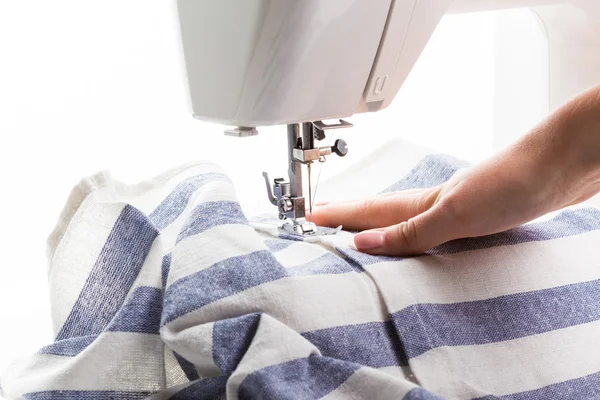 Women's hands behind her sewing — Stock Photo, Image