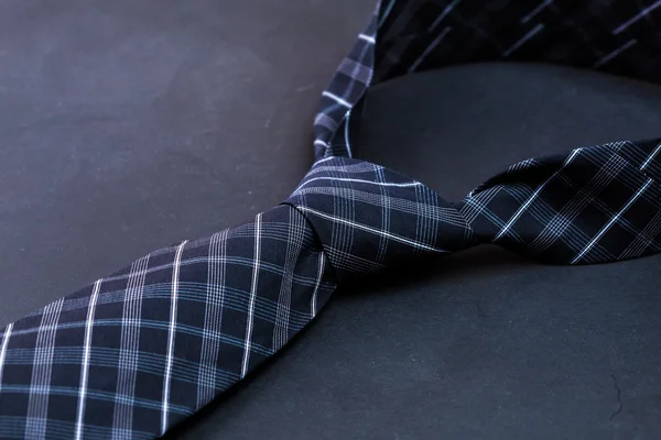 Man's tie on dark background — Stock Photo, Image