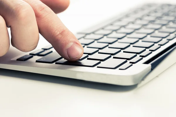 male hand on keyboard