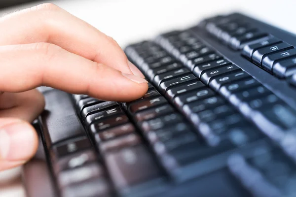 Male hand on keyboard — Stock Photo, Image