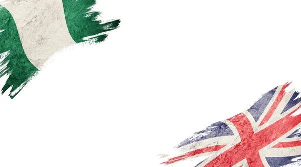 Флаги Нигерии Великобритании Белой Спине — стоковое фото