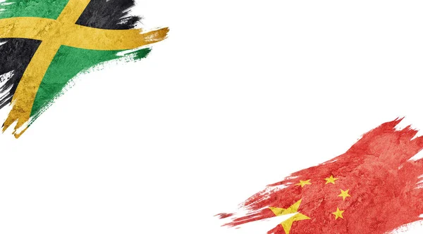 Флаги Ямайки Китая Белой Спине — стоковое фото