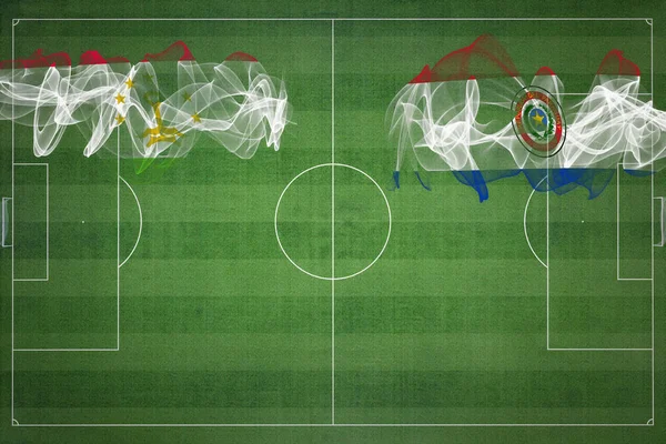 タジキスタンVsパラグアイサッカー試合 国内色 サッカー場 サッカーゲーム 競技コンセプト コピースペース — ストック写真