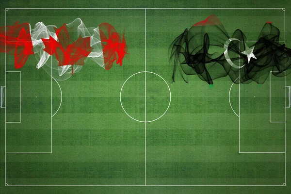 カナダVsリビアサッカーマッチ ナショナルカラー サッカー場 サッカーゲーム 競争の概念 コピースペース — ストック写真