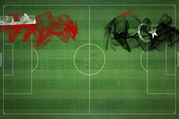 トンガ対リビアサッカーマッチ ナショナルカラー サッカー場 サッカーゲーム 競争の概念 コピースペース — ストック写真