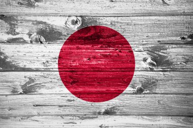 Ahşap arka planda Japon bayrağı