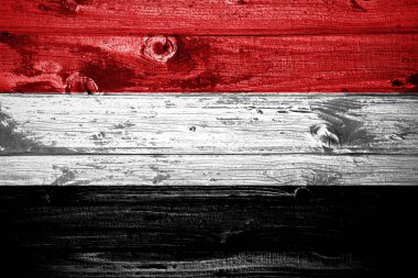 Ahşap arka plan tahta bayraklar üzerinde Yemen bayrağı