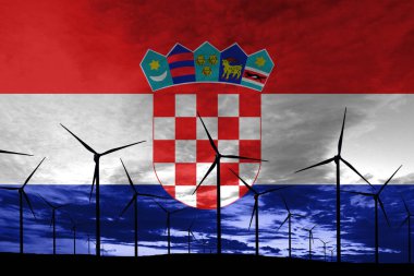 Hırvatistan günbatımında rüzgâr tarlası, sürdürülebilir kalkınma ve yenilenebilir enerji türbinleri bayrağı
