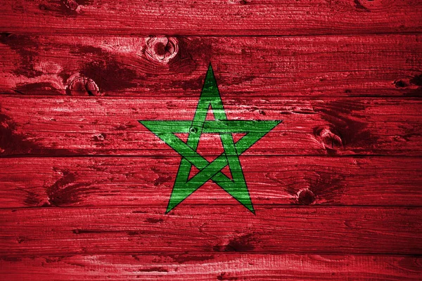 Morocco flag on wooden planks background wood flag