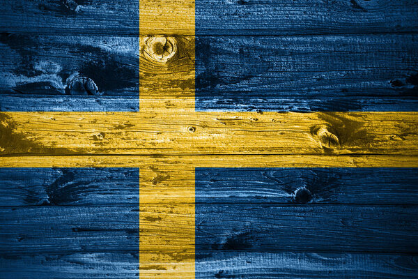 Флаг Швеции на деревянных досках