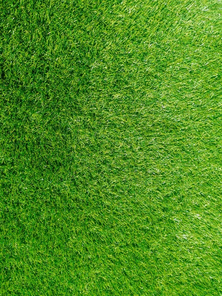 Artificial green grass, green grass, grass background texture