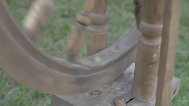 Antique Knitting Machine Stands Grass House — Stock Video
