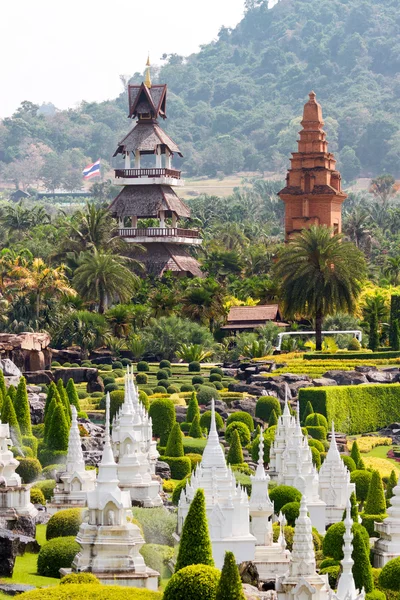 Nong Nooch Tropical Garden in Pattaya, Thailand. Panorama landscape view of formal garden. — Stock Photo, Image