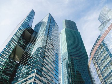 MOSCOW, RUSSIA - September 22, 2020. Bottom view of high towers of Moscow International Business Center (MIBC) on clear blue sky background.