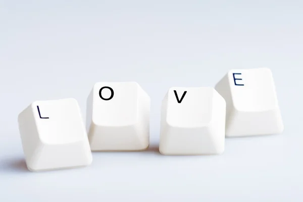 Word LOVE sur les boutons du clavier de l'ordinateur. Peut être utilisé comme symbole de l'amour sur Internet, lettres d'amour e-mail . — Photo