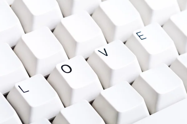 Word LOVE sulla tastiera del computer con spazio vuoto su altri pulsanti. Può essere usato come simbolo di amore su Internet, lettere di posta elettronica di amore . — Foto Stock