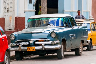 HAVANA, CUBA - February 5, 2008. Classic oldtimer car parked on street. Most of the Cubans drive cars that were on the road before 1959.