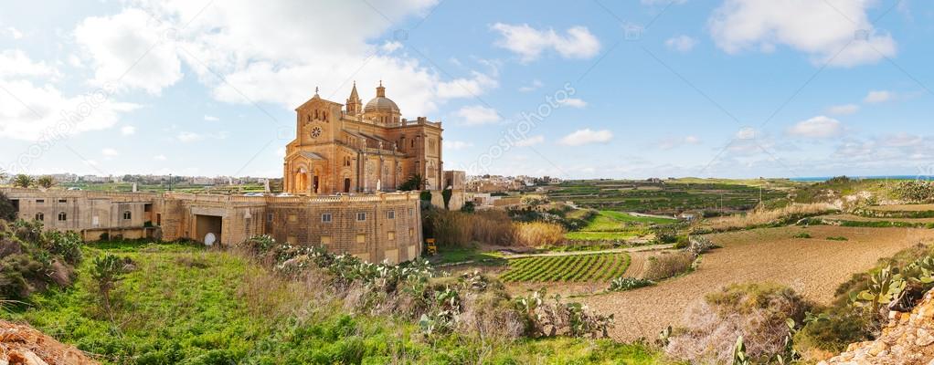 Ta' Pinu Church in village Gharb, Gozo island, Malta. The famous Madonna church is dedicated to the Blessed Virgin of Ta' Pinu. Panorama view.