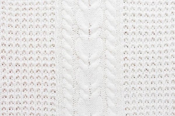 Résumé fond tricoté. Laine texture pull blanc. Image rapprochée du motif tricoté . — Photo