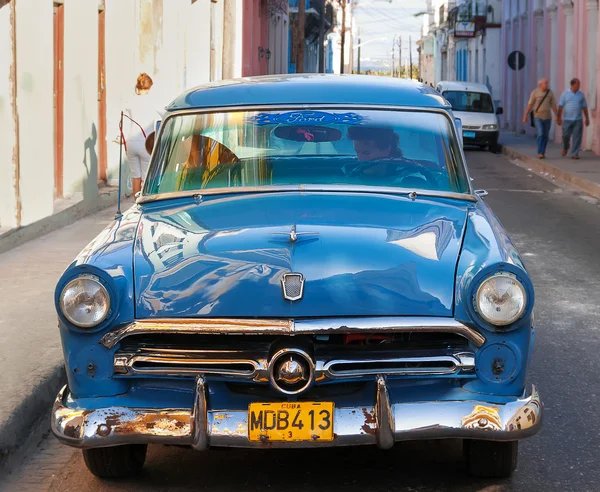 MATANZAS, CUBA - February 5, 2008. Classic oldtimer car parked on street. Most of the Cubans drive cars that were on the road before 1959. Stock Picture