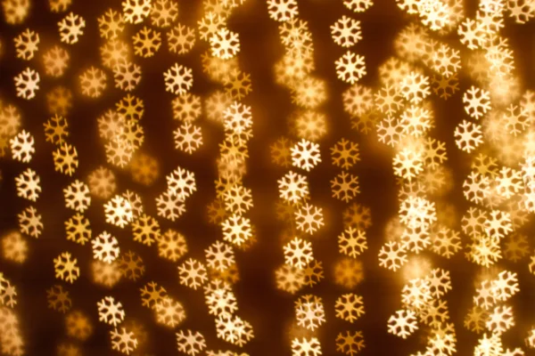 Blurring lights bokeh background of snowflakes — Stock Photo, Image