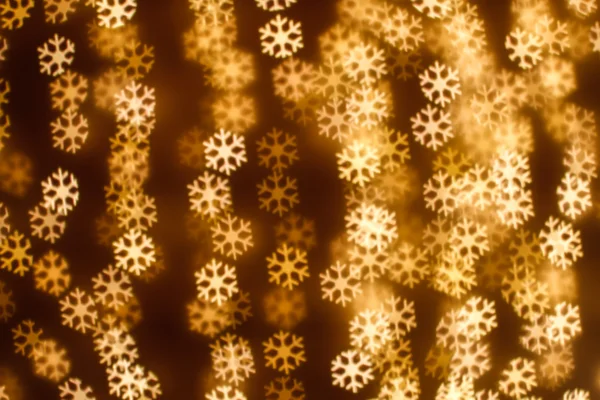 Blurring lights bokeh background of snowflakes — Stock Photo, Image