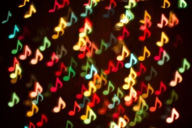 Renkli müzik notlar ışıklar bokeh arka plan bulanıklık